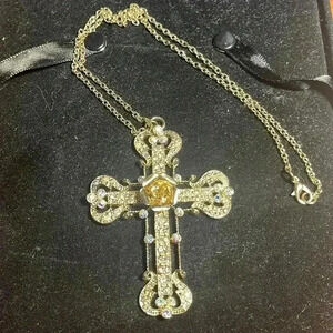 Vintage cross. The stones in this are just absolutely stunning.